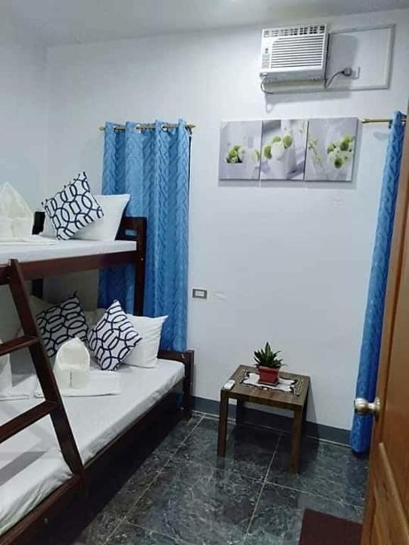 הוסטל בקורון, לינה בקורון, hostel coron, coron backpackers, פיליפינים קורון הוסטל- איסט קארד