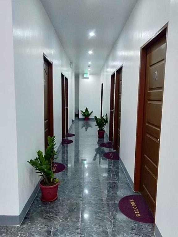 הוסטל בקורון, לינה בקורון, hostel coron, coron backpackers, פיליפינים קורון הוסטל- איסט קארד