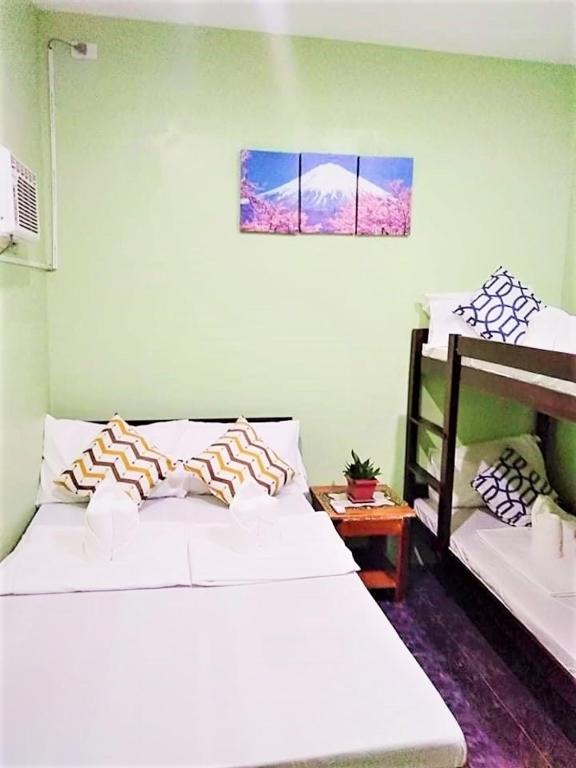 הוסטל בקורון, לינה בקורון, hostel coron, coron backpackers, פיליפינים קורון הוסטל- איסט קארד